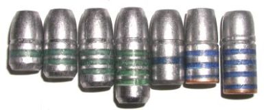 Beveled "checkless" projectiles vs two gas-checked projectiles ( right ).
